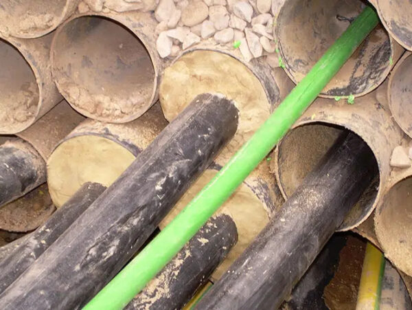 Densoseal 16A being applied around enclosed rebar