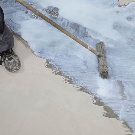 Application of Ardex P51 Concentrated with a broom