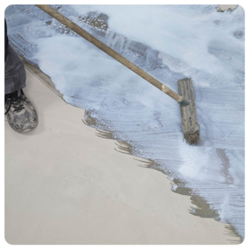 Ardex P51 Man Applying Ardex P51 Primer